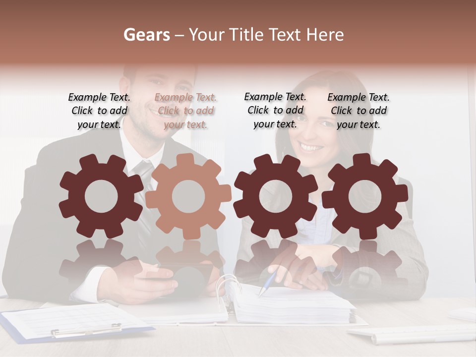 A Man And A Woman Sitting At A Desk PowerPoint Template