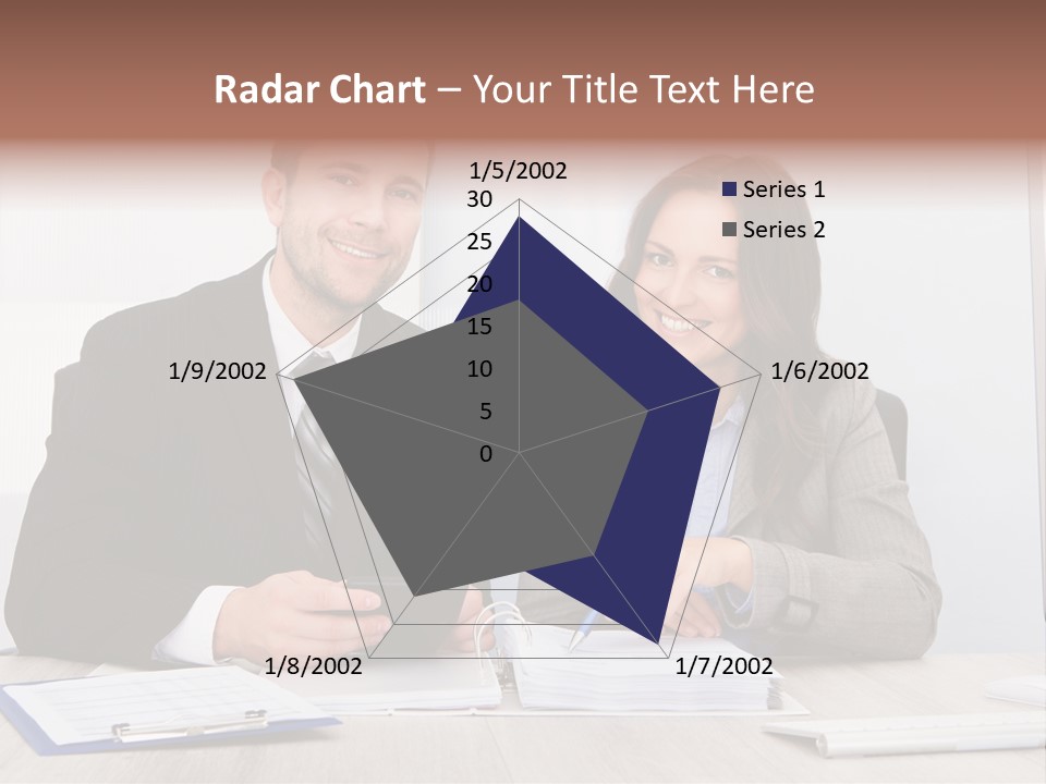 A Man And A Woman Sitting At A Desk PowerPoint Template