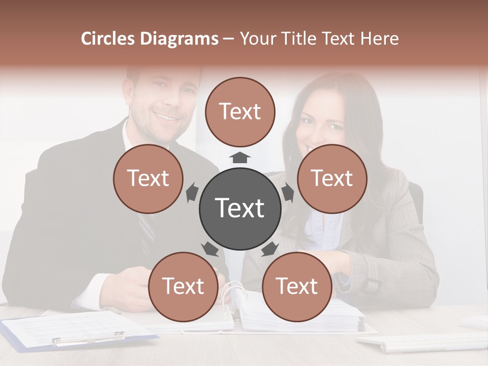 A Man And A Woman Sitting At A Desk PowerPoint Template