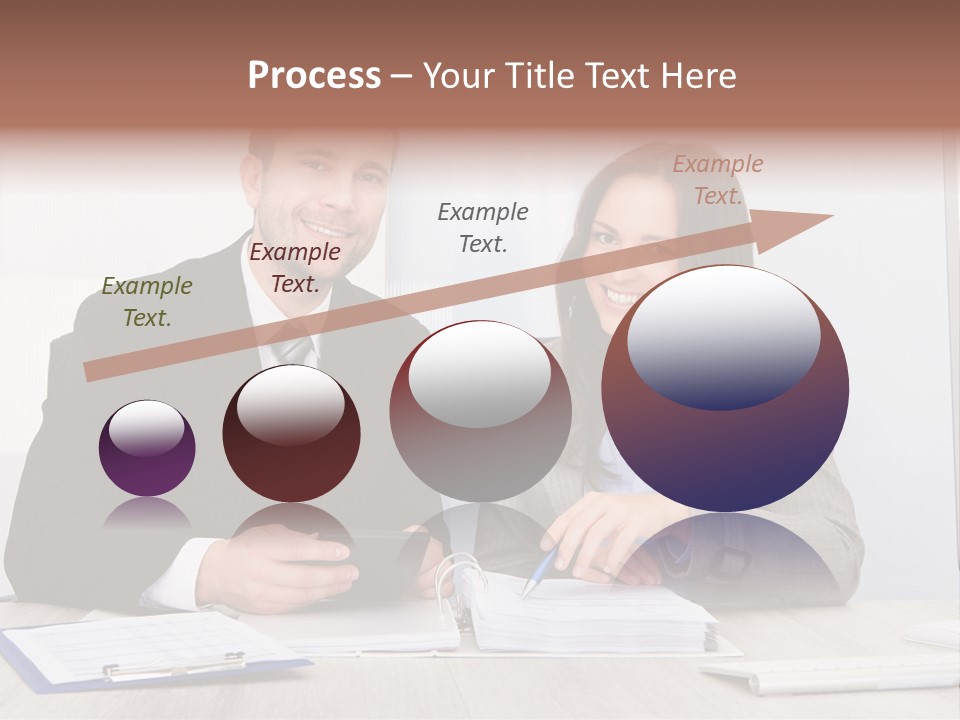 A Man And A Woman Sitting At A Desk PowerPoint Template