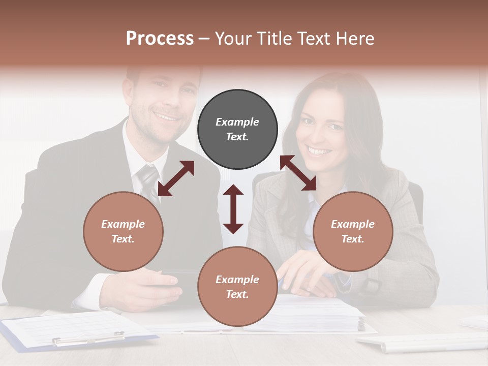 A Man And A Woman Sitting At A Desk PowerPoint Template
