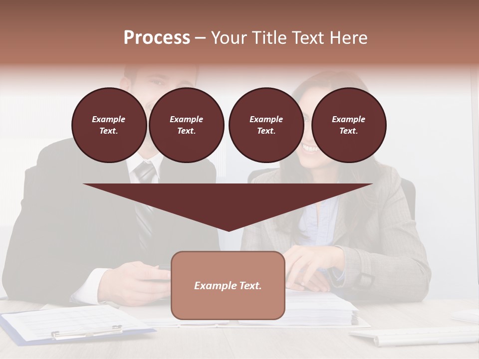 A Man And A Woman Sitting At A Desk PowerPoint Template
