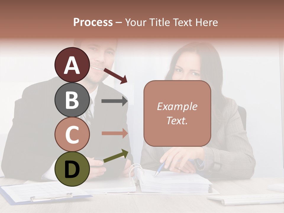 A Man And A Woman Sitting At A Desk PowerPoint Template
