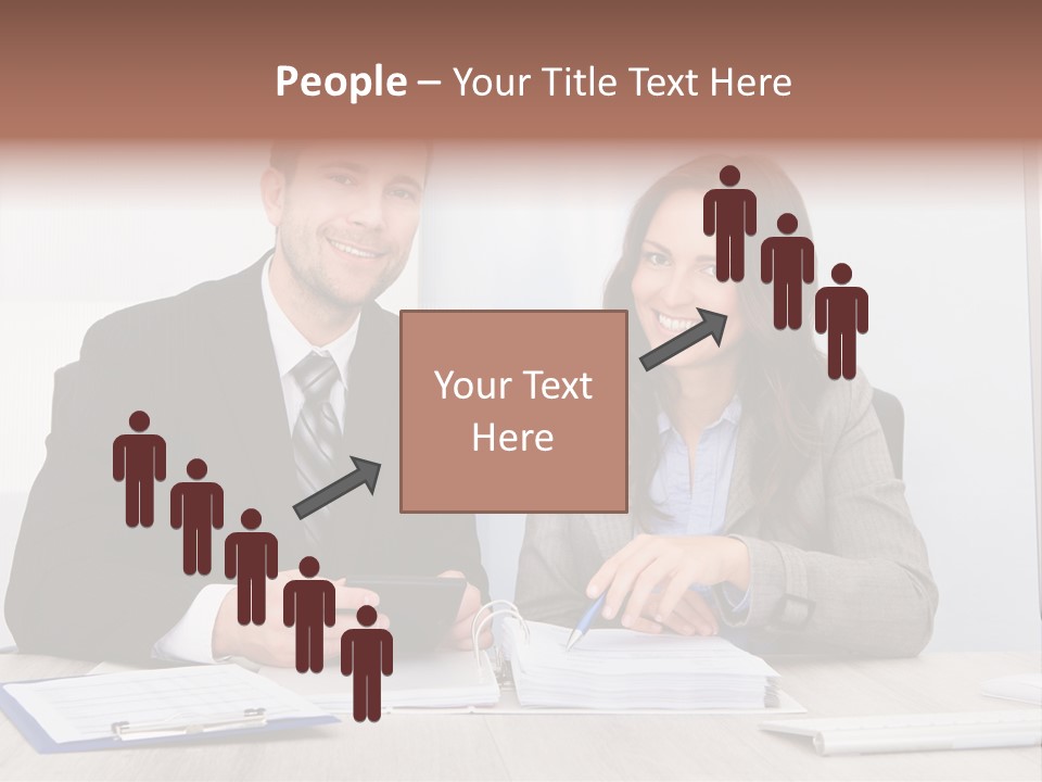 A Man And A Woman Sitting At A Desk PowerPoint Template