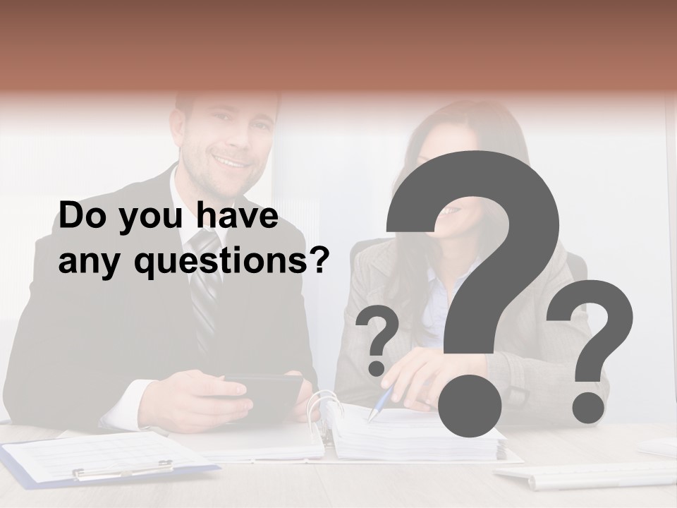 A Man And A Woman Sitting At A Desk PowerPoint Template