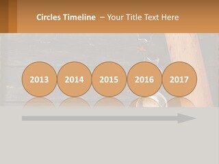 A Wooden Table Topped With A Cookie Cutter And Star Anise PowerPoint Template