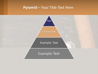 A Wooden Table Topped With A Cookie Cutter And Star Anise PowerPoint Template