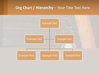 A Wooden Table Topped With A Cookie Cutter And Star Anise PowerPoint Template