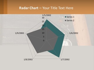 A Wooden Table Topped With A Cookie Cutter And Star Anise PowerPoint Template