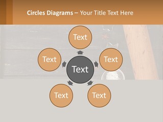 A Wooden Table Topped With A Cookie Cutter And Star Anise PowerPoint Template