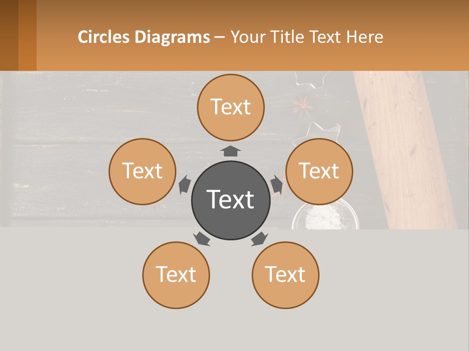 A Wooden Table Topped With A Cookie Cutter And Star Anise PowerPoint Template
