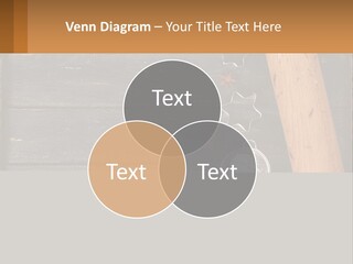 A Wooden Table Topped With A Cookie Cutter And Star Anise PowerPoint Template