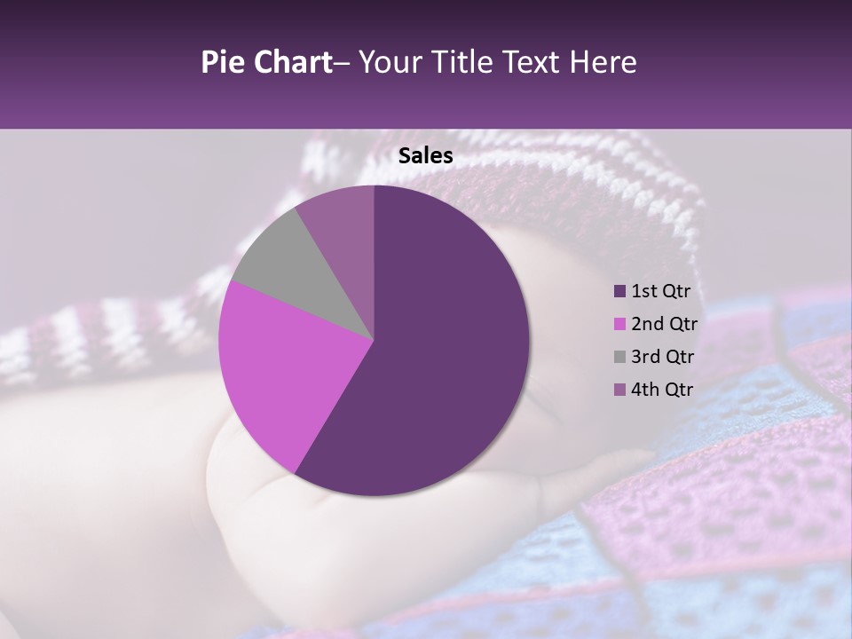 A Baby Wearing A Knitted Hat Laying On A Blanket PowerPoint Template