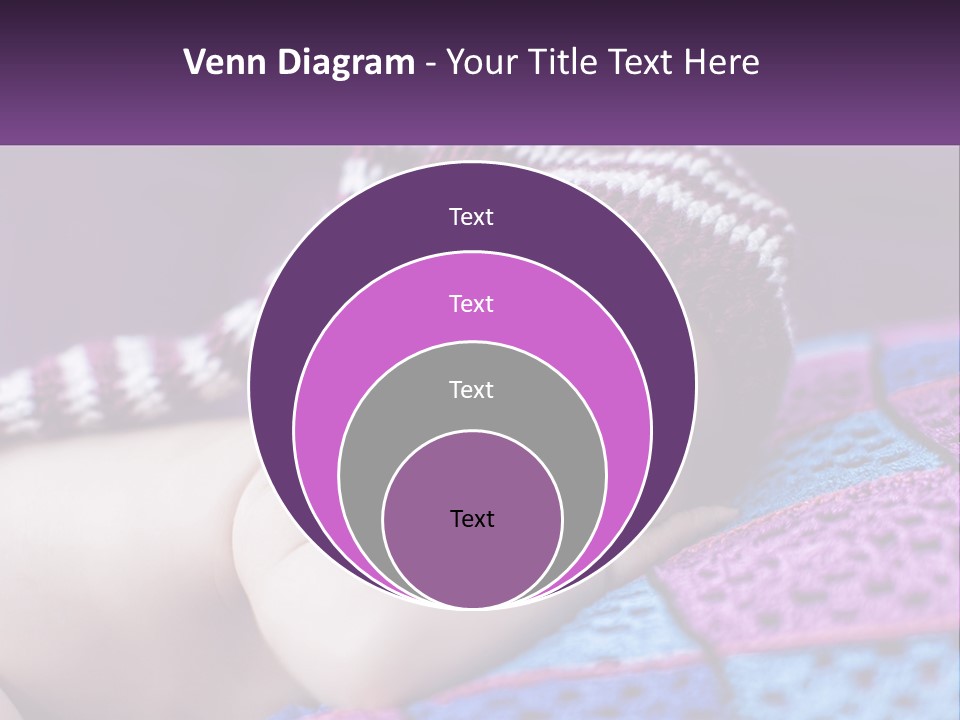 A Baby Wearing A Knitted Hat Laying On A Blanket PowerPoint Template