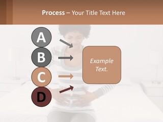 A Woman Standing On A Bed Holding Her Stomach PowerPoint Template