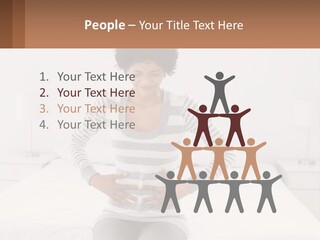 A Woman Standing On A Bed Holding Her Stomach PowerPoint Template