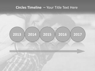 A Man Holding A Woman In His Arms PowerPoint Template