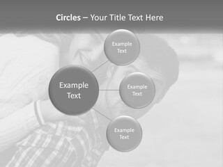 A Man Holding A Woman In His Arms PowerPoint Template