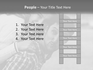 A Man Holding A Woman In His Arms PowerPoint Template