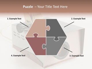 A Small Projector With A Camera Attached To It PowerPoint Template