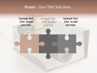 A Small Projector With A Camera Attached To It PowerPoint Template