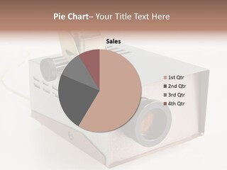 A Small Projector With A Camera Attached To It PowerPoint Template