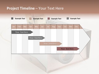 A Small Projector With A Camera Attached To It PowerPoint Template
