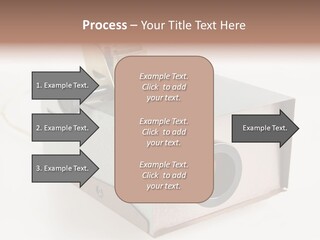 A Small Projector With A Camera Attached To It PowerPoint Template