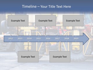 A Large Yellow Machine Is Parked In Front Of A Building PowerPoint Template