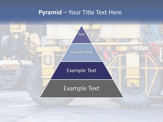 A Large Yellow Machine Is Parked In Front Of A Building PowerPoint Template
