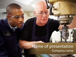 Two Men Working On A Machine In A Factory PowerPoint Template