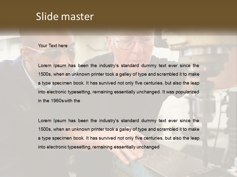 Two Men Working On A Machine In A Factory PowerPoint Template