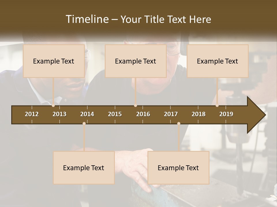 Two Men Working On A Machine In A Factory PowerPoint Template