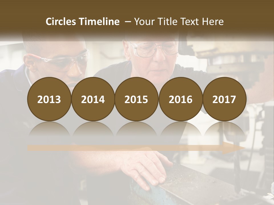 Two Men Working On A Machine In A Factory PowerPoint Template