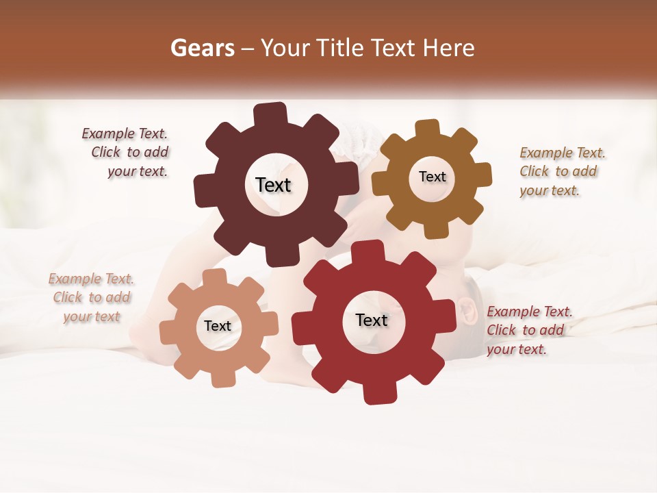 A Baby Laying On A Bed With A White Blanket PowerPoint Template