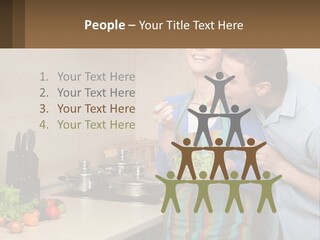 A Man And Woman Preparing Food In A Kitchen PowerPoint Template