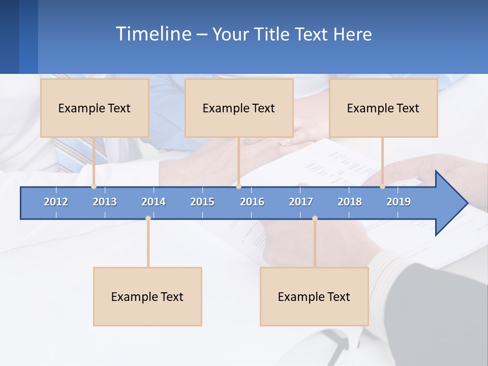 A Group Of People Sitting Around A Table With Papers PowerPoint Template