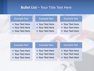A Group Of People Sitting Around A Table With Papers PowerPoint Template