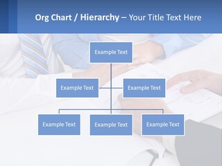 A Group Of People Sitting Around A Table With Papers PowerPoint Template