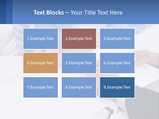 A Group Of People Sitting Around A Table With Papers PowerPoint Template
