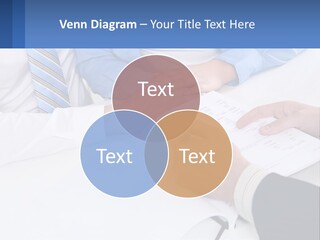 A Group Of People Sitting Around A Table With Papers PowerPoint Template