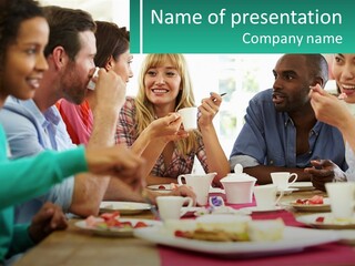 A Group Of People Sitting Around A Table Eating Food PowerPoint Template