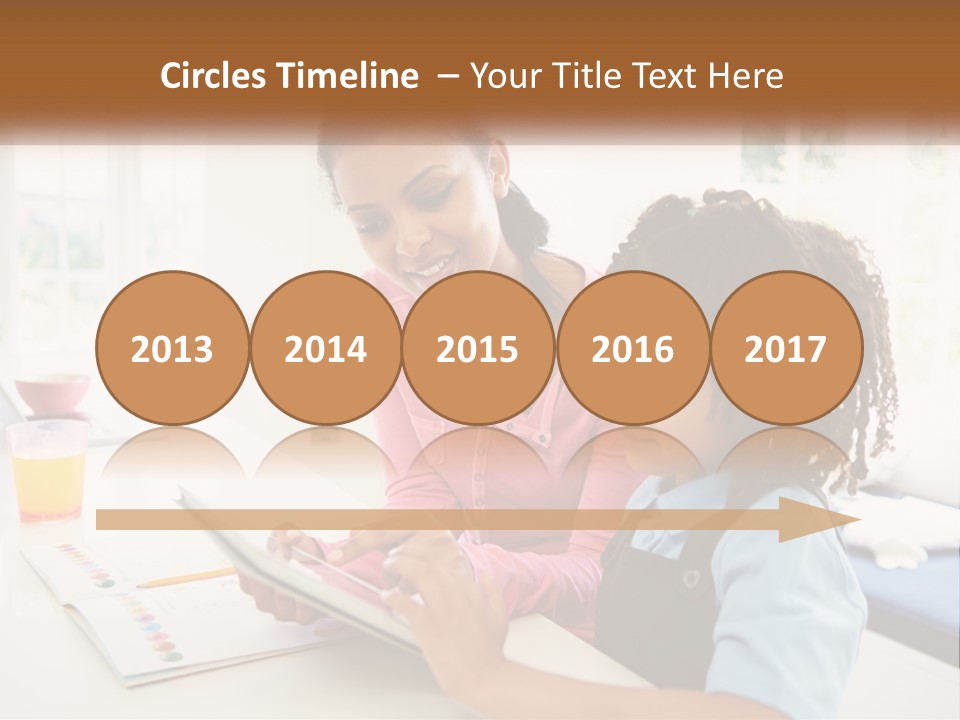 A Woman And A Child Are Looking At A Book PowerPoint Template