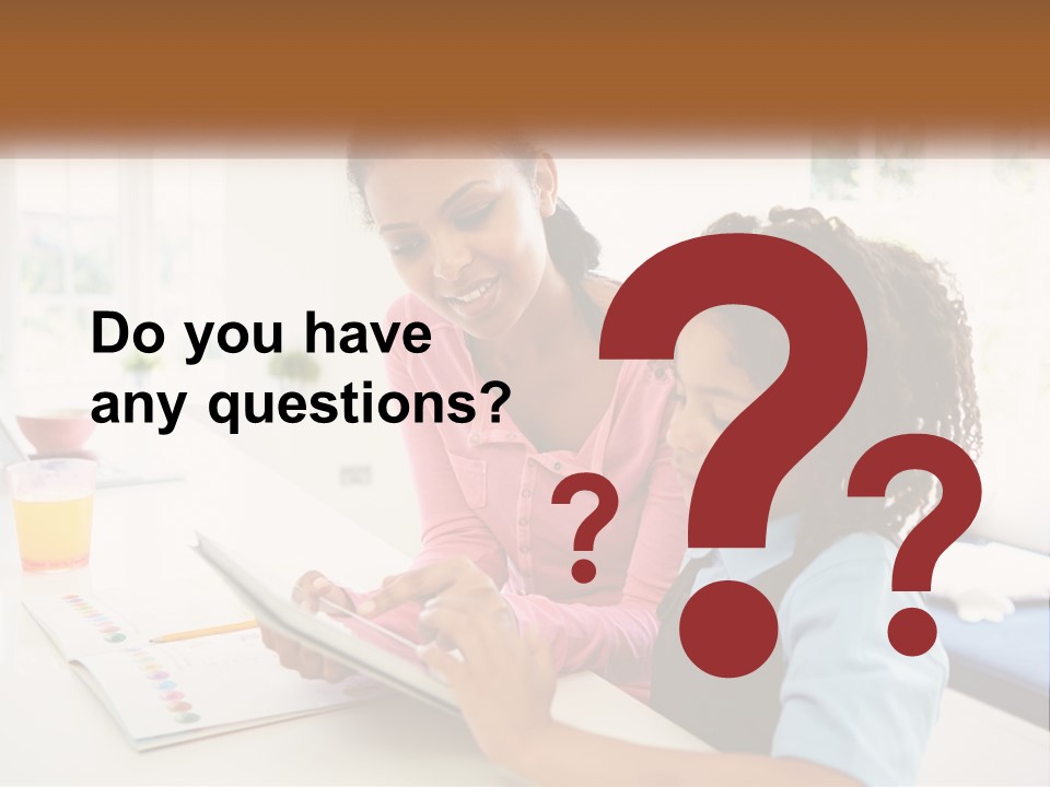 A Woman And A Child Are Looking At A Book PowerPoint Template