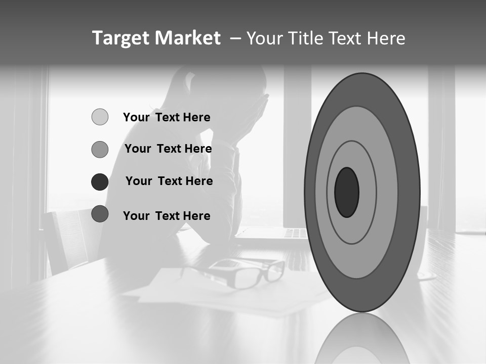 A Woman Sitting At A Desk With Her Head In Her Hands PowerPoint Template