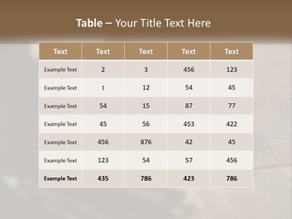 A Bunch Of Keys Sitting On Top Of A Wooden Table PowerPoint Template