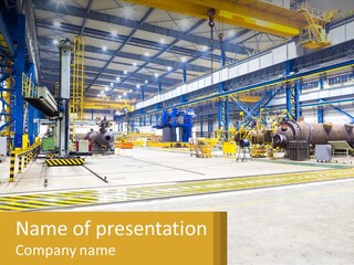 A Large Industrial Power Plant With Lots Of Machinery PowerPoint Template