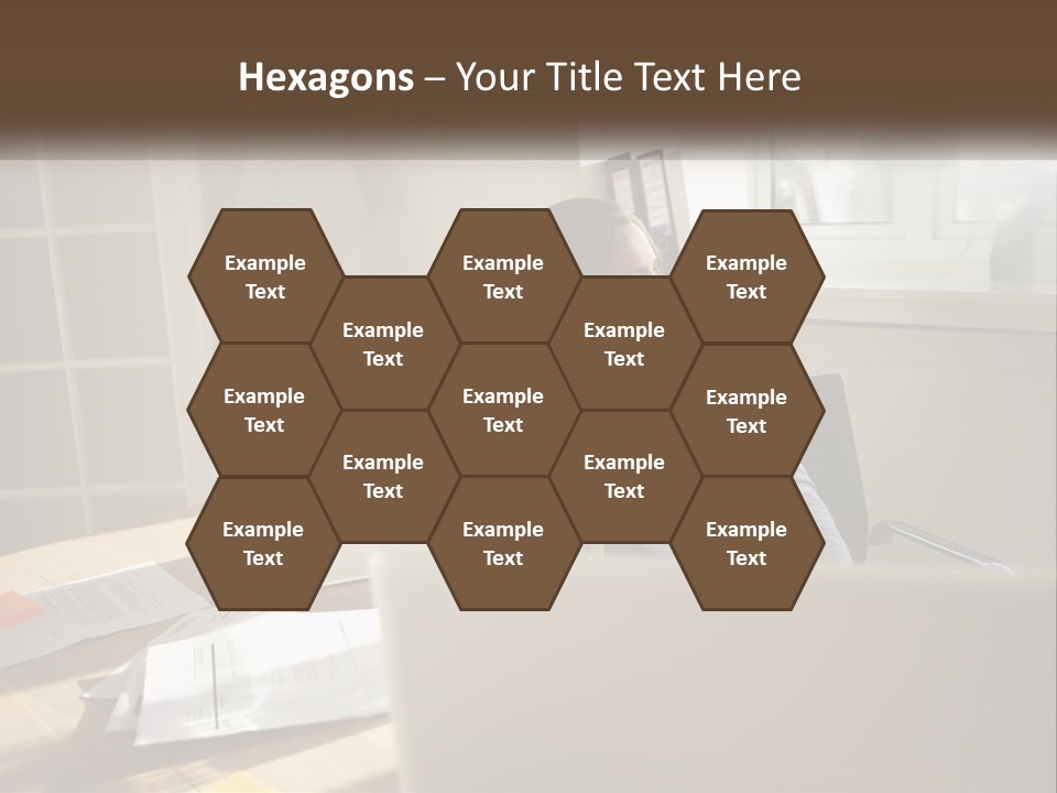 A Woman Sitting At A Desk In Front Of A Laptop Computer PowerPoint Template