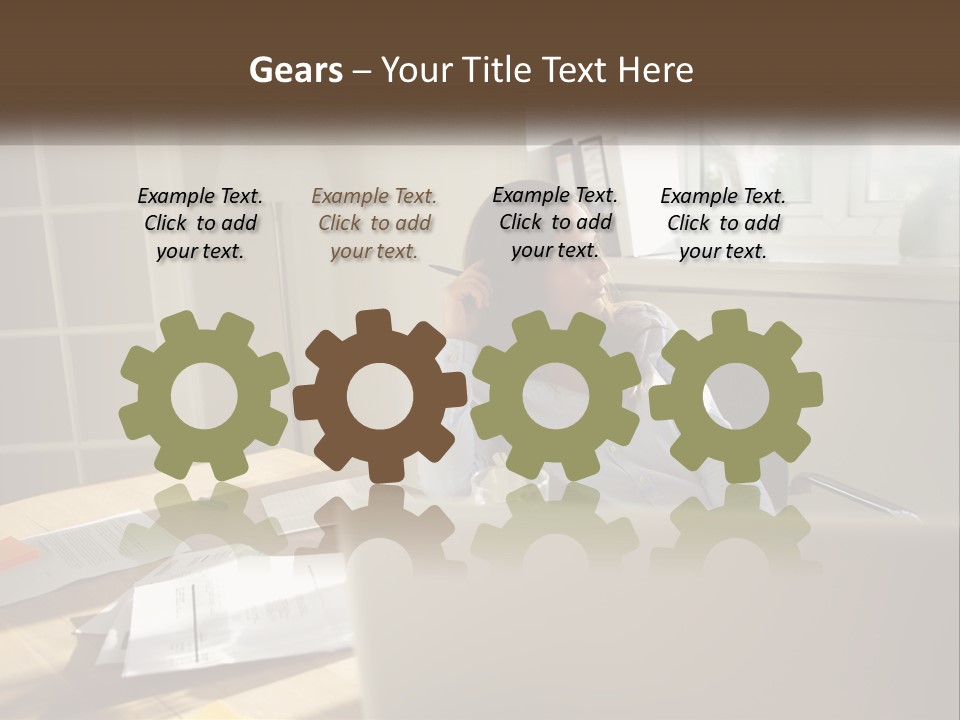 A Woman Sitting At A Desk In Front Of A Laptop Computer PowerPoint Template