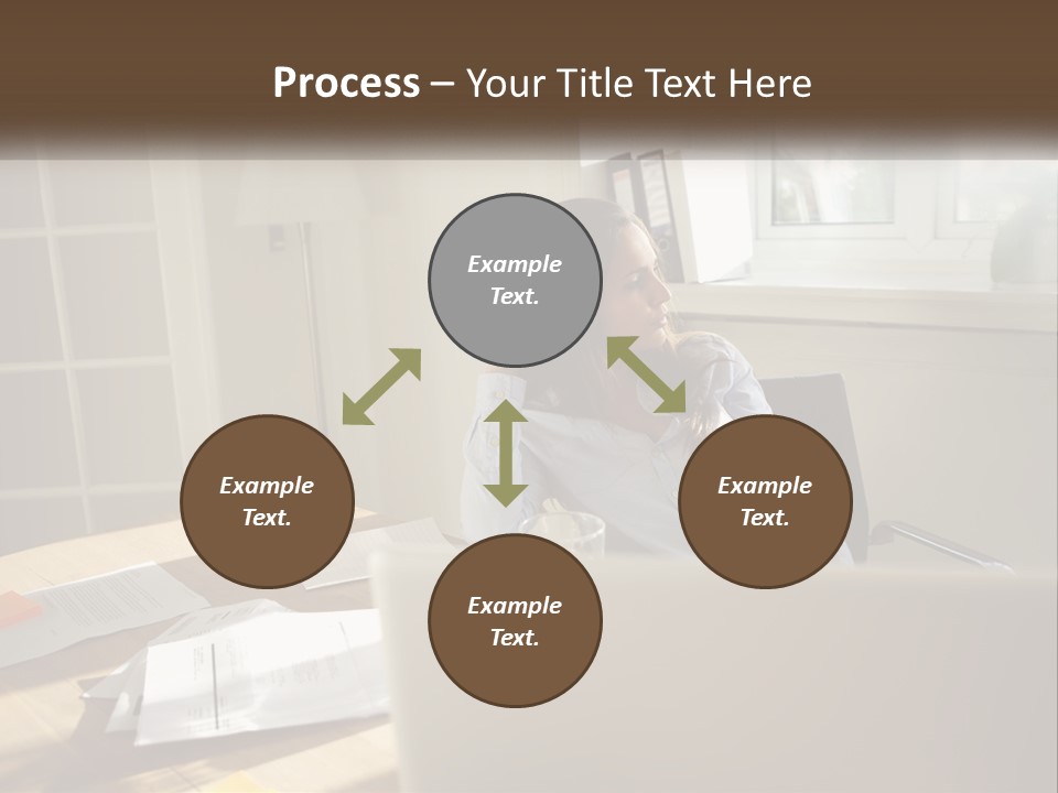 A Woman Sitting At A Desk In Front Of A Laptop Computer PowerPoint Template